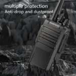 Baofeng BF-M4 analog handheld transceiver with antenna held in hand