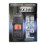 HX-380 floating marine VHF handheld transceiver held in hand