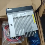 Motorola DM4401 vehicle mobile radio with GPS held in hand