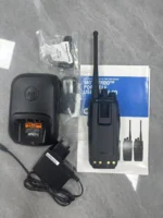 Motorola DP3601 GPS digital handheld radio held in hand