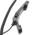 Motorola H250 shoulder speaker microphone with 2.5mm plug held in hand