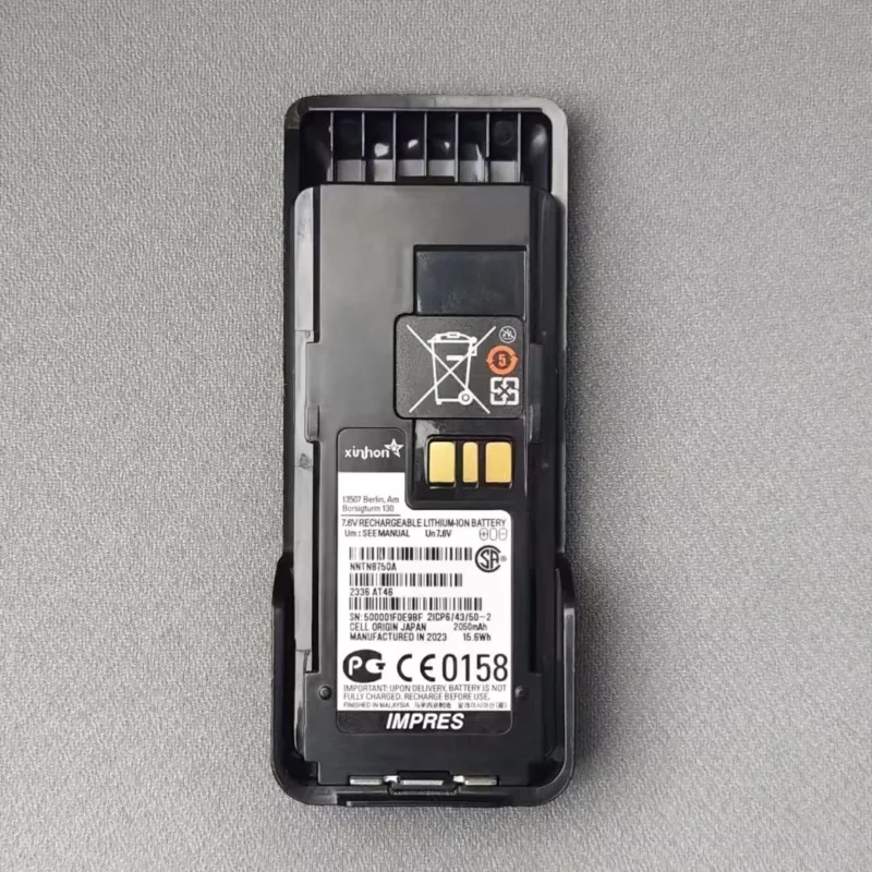 Detail shot of the Motorola NNTN8750A IMPRES 2075mAh APX4000H radio battery