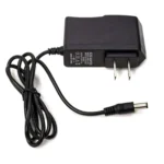Package contents of the Motorola PMLN5400 single-bay desktop charger for CP series radios