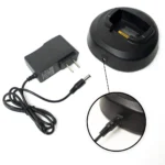 Close-up of the Motorola PMLN5400 single-bay desktop charger for CP series radios