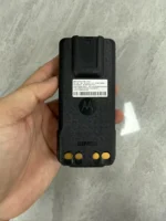 2900mAh PMNN4489A two-way radio battery pack held in hand