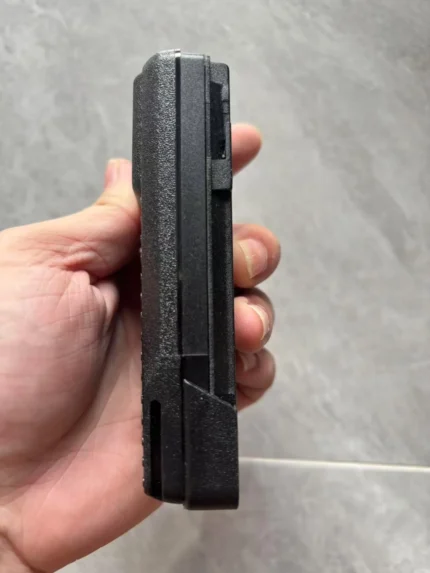 Package contents of the Motorola PMNN4490 intrinsically safe two-way radio battery