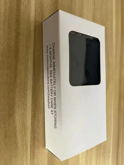 Motorola PMNN4491 IMPRES 2100mAh IP68 battery held in hand