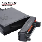 Yaesu FT-7900R 50W dual band ham mobile radio unit held in hand